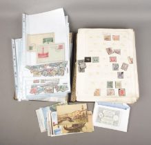 A album containing a good collection of world stamps to include 14 Victorian Penny Reds, Belgian,