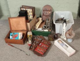 Three boxes of miscellaneous to include composite figures, art glass vase, commemorative spoons,