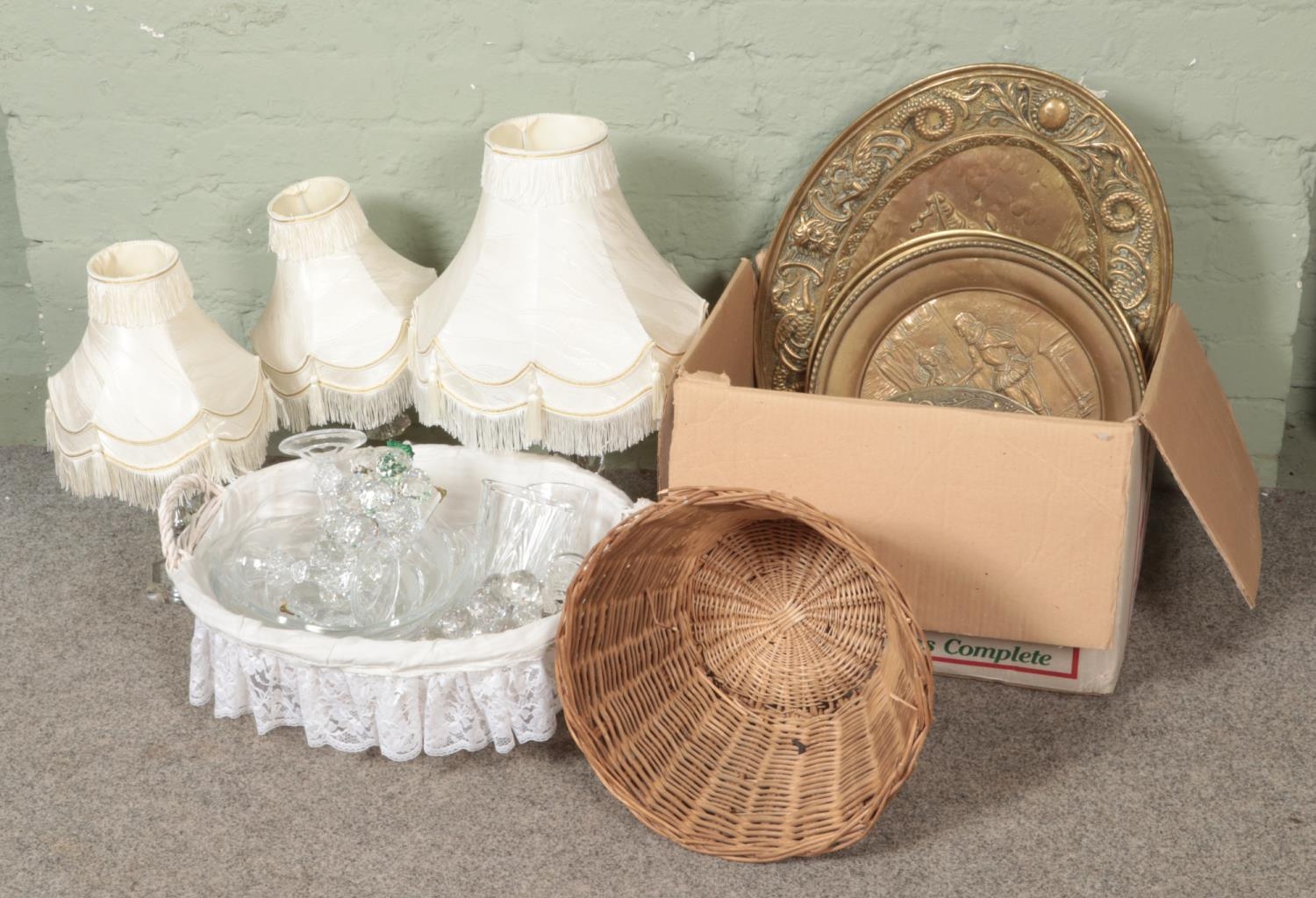 A quantity of glass items including table lamps together with a selection of brass plaques