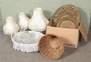 A quantity of glass items including table lamps together with a selection of brass plaques