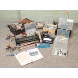 A large collection of assorted model boat building materials, tools and accessories to include