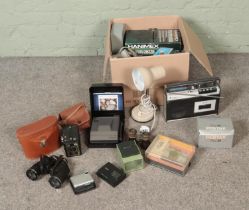 A box of mostly photographic equipment and accessories to include Kodak 277X, Polaroid Image System,