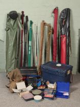 A collection of fishing equipment. Includes Shakespeare, Abu and Browning rods, Shimano Sedona reel,