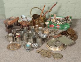 A quantity of metalwares including pewter tankards, silver plate items, copper and brass kettle,