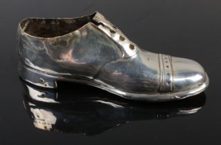 A novelty silver pin cushion in the form of a shoe assayed Birmingham 1940 S Blanckensee & Son