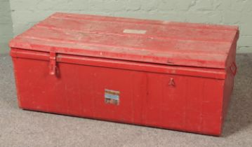 A large red tin trunk. Hx40cm Wx144cm Dx60cm