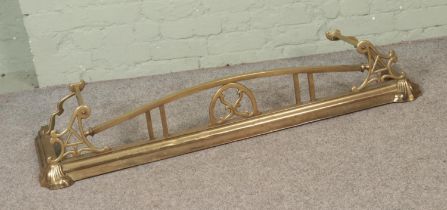 A brass non extending fire fender