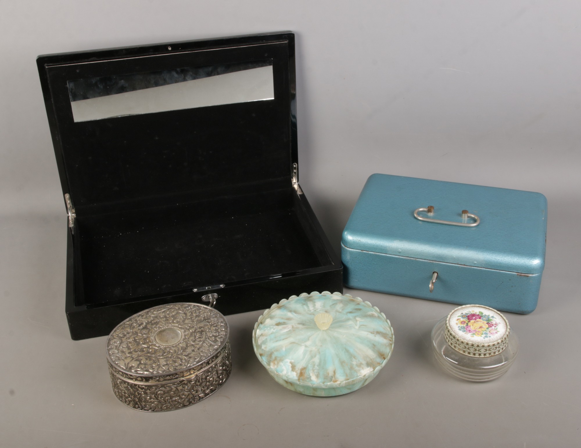 A collection of empty boxes to include jewellery box, cash tin, white metal jewellery casket, etc.
