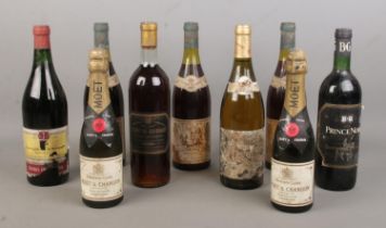 Nine sealed bottles of vintage alcohol. To include 1966 Caves Syndicates de Bourgogne, 1977 Cuvee Du