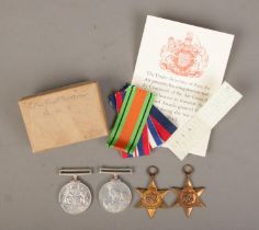 A set of four WWII medals to include 1939-45 Star, France and Germany Star, Defence Medal and War