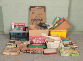 A large quantity of vintage toys and games, including board games such as Scrabble, Trivial