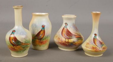 Four small Locke & Co Worcester vases. All hand painted and decorated with a pheasant. Signed H Wall