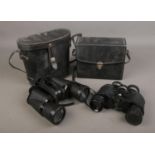 Two pairs of vintage binoculars including a Prinz and a Commodore example.