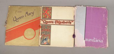 Three Cunard White Star Line book detailing the launches of the 'Queen Elizabeth', 'Queen Mary'