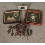 A collection of assorted clocks to include carved cuckoo, Ko Chi Quartz in the form of a train