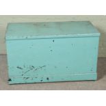 A painted pine blanket box with interior candle box drawers.