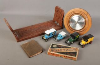A group of collectables. Includes Eastern book slide, Rolls Razor, barometer, autograph book with