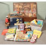 A large collection of vintage games and toys including scrabble, monopoly, dad's army board game,