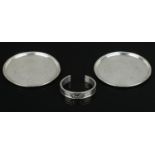 Georg Jensen & Wendel; Two silver coasters in the 'Lily of the Valley' design, stamped 'Sterling,