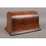 A late Nineteenth/early Twentieth Century burr walnut tea caddy of D-shaped form with swooping