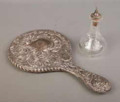 Two pieces of silver to include silver handled mirror (Chester 1905) and Barker Brothers Silver