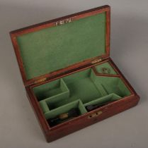 A late 19th/early 20th century mahogany pistol box. Height 6cm, Width 25cm, Depth 15cm.