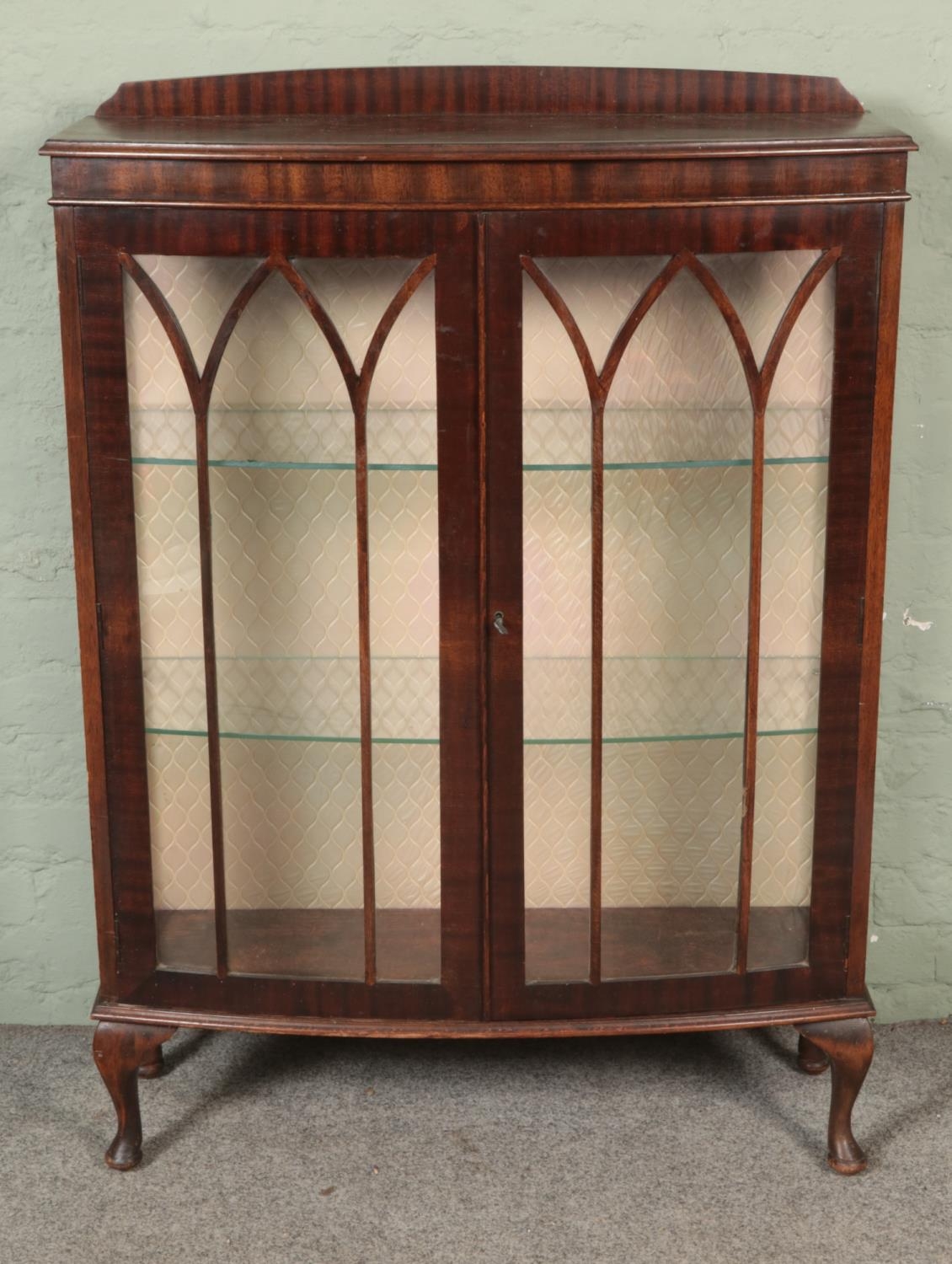 A glazed display cabinet on cabriole legs. Hx94cm Wx89cm Dx31cm