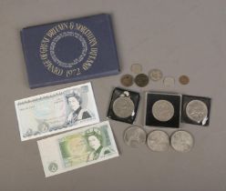 A small collection of British pre-decimal coins and banknotes to include Coinage of Britain and