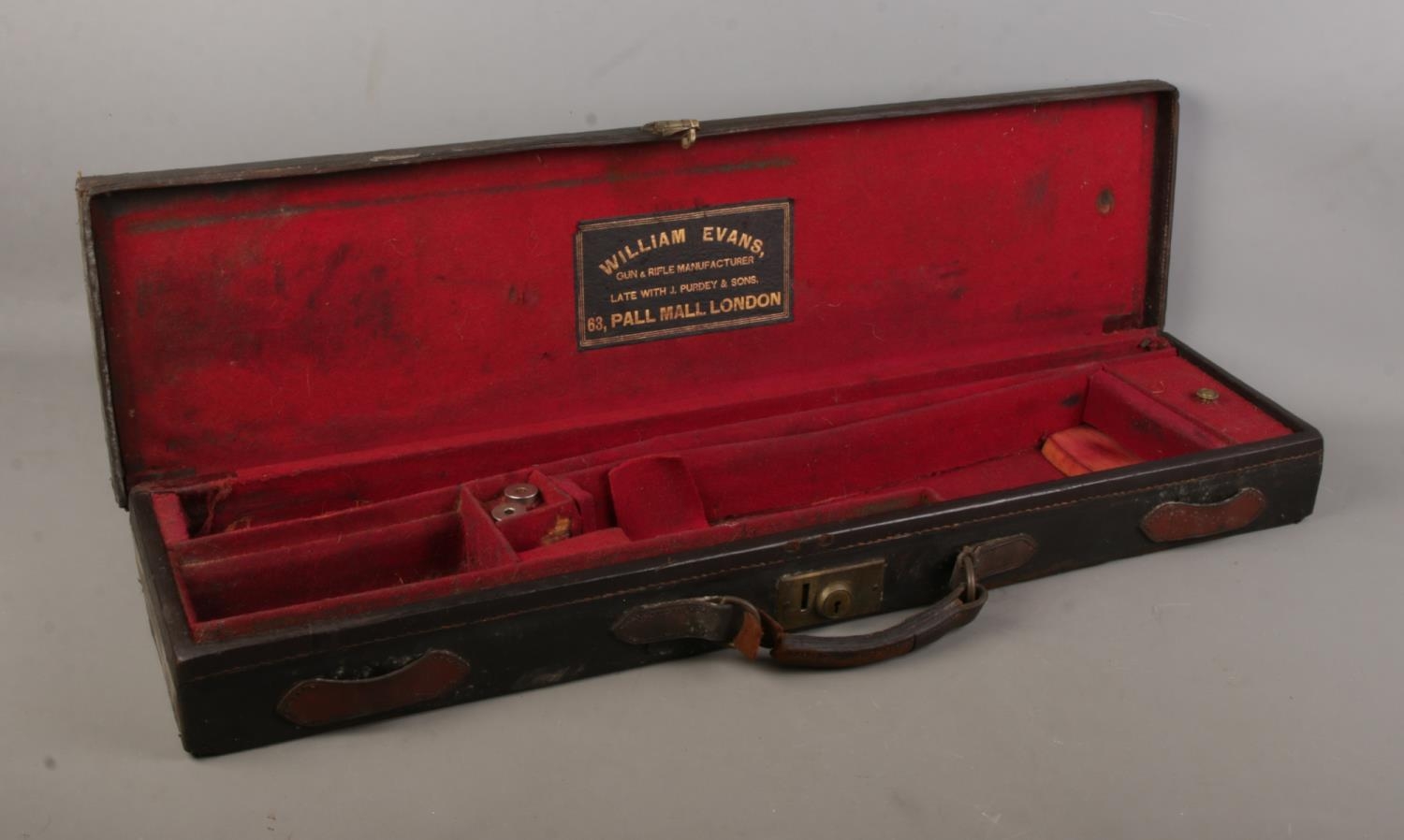 A late 19th/early 20th century gun case by William Evans, Pall Mall. The top stamped for Lt Col FH