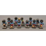 A collection of vintage Robertson's football figures, 11 in total.