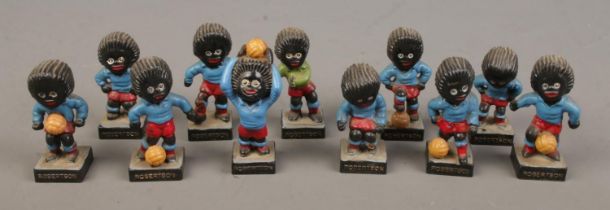 A collection of vintage Robertson's football figures, 11 in total.