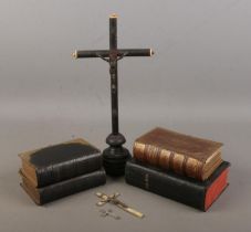 A collection of religious items. Includes ebonised crucifix, two smaller crucifix and 19th century