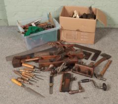 A large quantity of woodworking tools including planes, chisels, screw drivers, wood turning