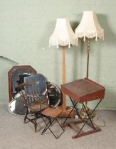 A brass rope twist standard lamp with another wooden example, small child's school desk and child'