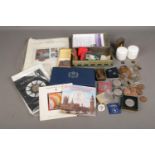 A collection of coins including A 1977 Queens jubilee coin set, Marksman lager brilliant