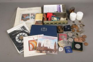 A collection of coins including A 1977 Queens jubilee coin set, Marksman lager brilliant
