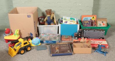 Four boxes of assorted toys and vintage games, to include Monopoly, Spin Golf, miniature model