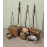 A collection of metalwares including jam pans, coal bucket, magazine rack, bed warmer pans, etc