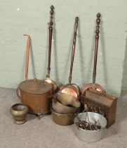 A collection of metalwares including jam pans, coal bucket, magazine rack, bed warmer pans, etc