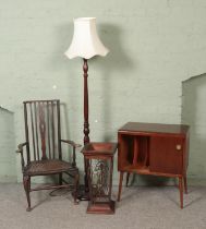 A collection of assorted furniture to include turned standard lamp, vinyl record cabinet, stick