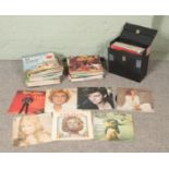 A collection of vinyl records inlcuding Barry Manilow, Paul Young, Elaine Paige, Barbra Streisand,