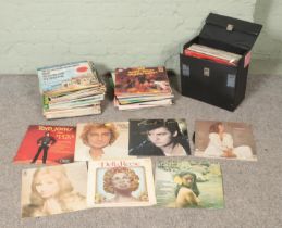 A collection of vinyl records inlcuding Barry Manilow, Paul Young, Elaine Paige, Barbra Streisand,