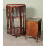 A vintage mahogany display cabinet with mirrored back with a burr walnut bedside cabinet.