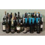 Two large boxes of assorted mainly vintage alcohol, to include vintage port, Hardy's, Martini and