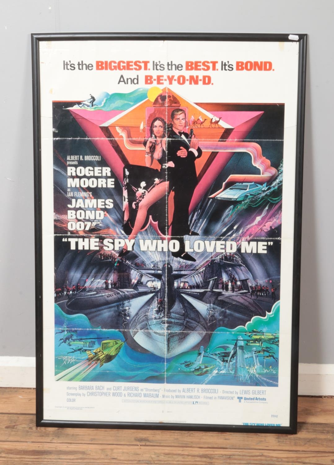 A US James Bond "The Spy Who Loved Me" framed one sheet poster featuring artwork by Bob Peak.