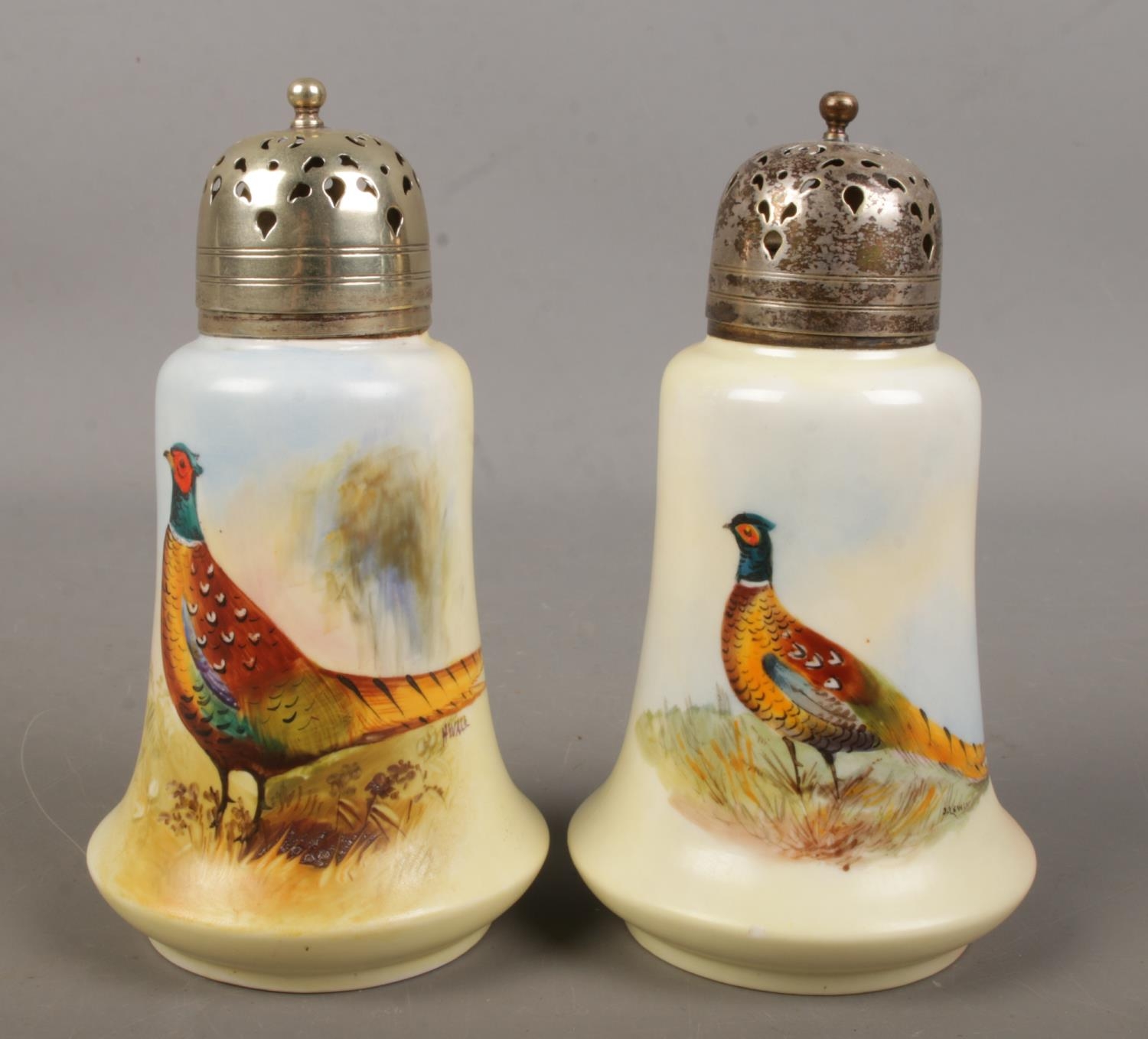 Two Locke & Co Worcester sugar shakers. Both hand painted and decorated with a pheasant. Signed H