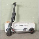 A Ninebot by Segway electric KickScooter. With box. No charging cable. Does power up and run. Screws