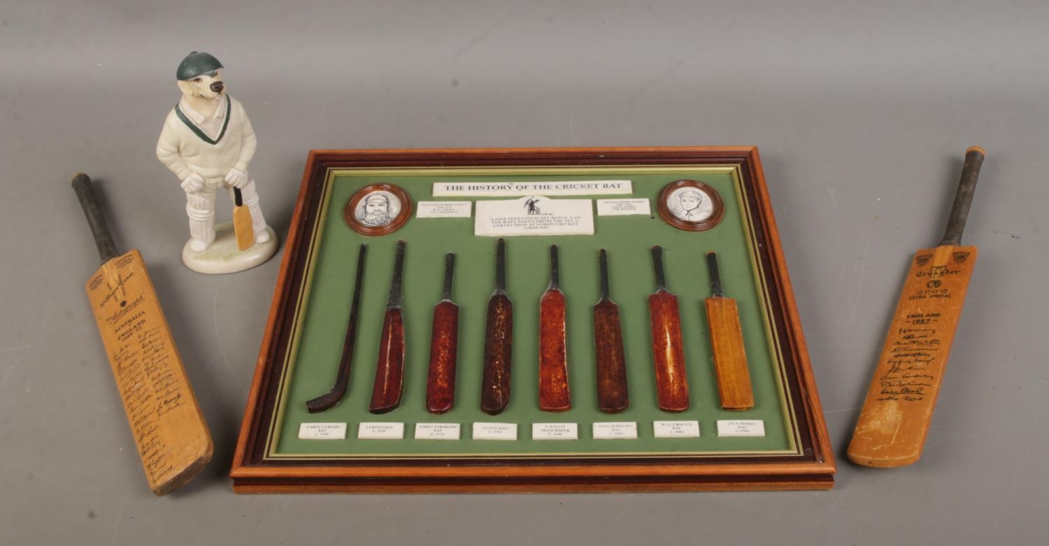 A small collection of cricket memorabilia, to include 'The History of the Cricket Bat' display,