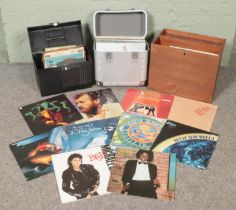 Two boxes and a carry case of assorted records, including rock and pop vinyl records, to include