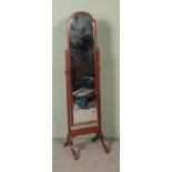 A mahogany cheval mirror. Approx. height 157cm.